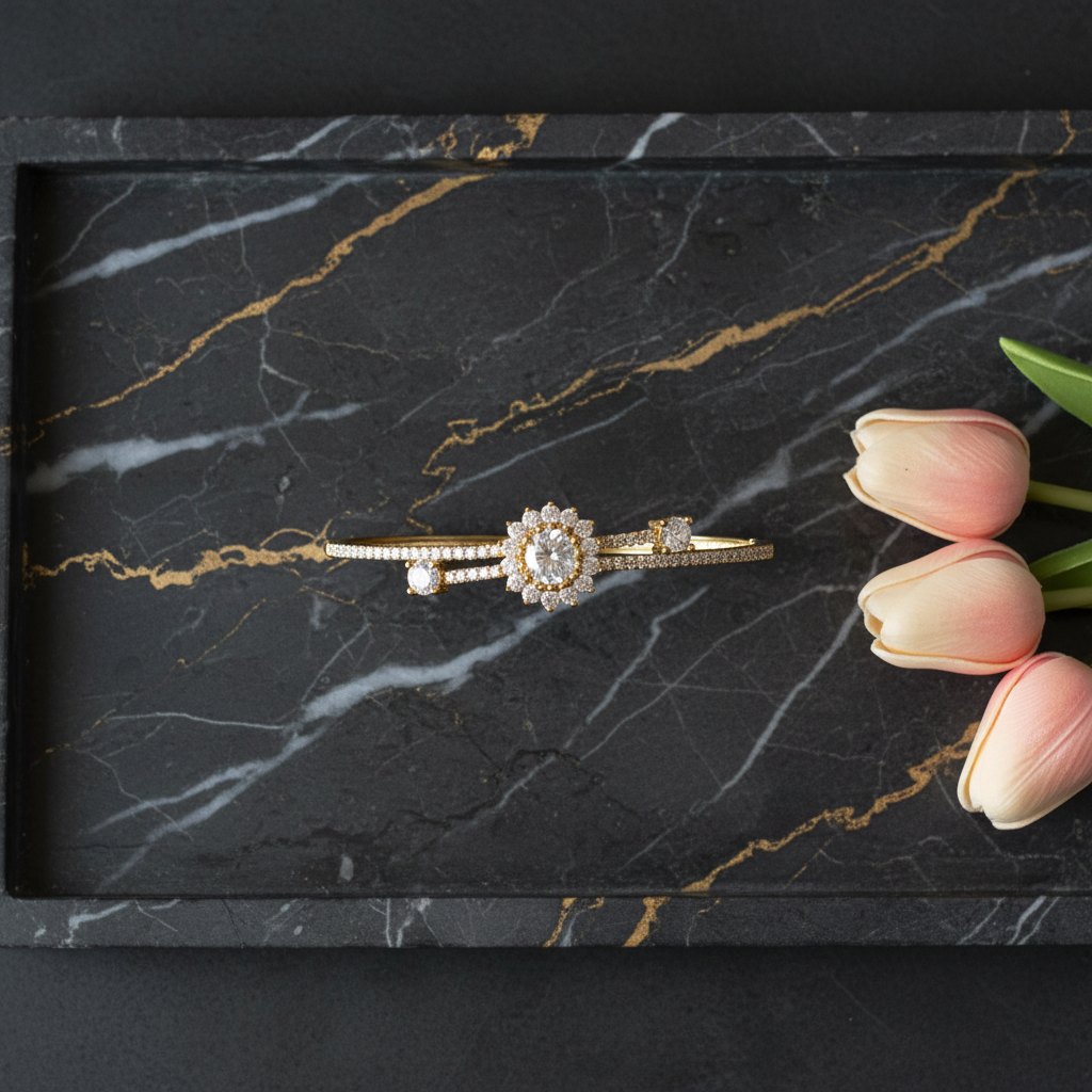 AD Bracelet Flatlay on Dark Marble with Tulips