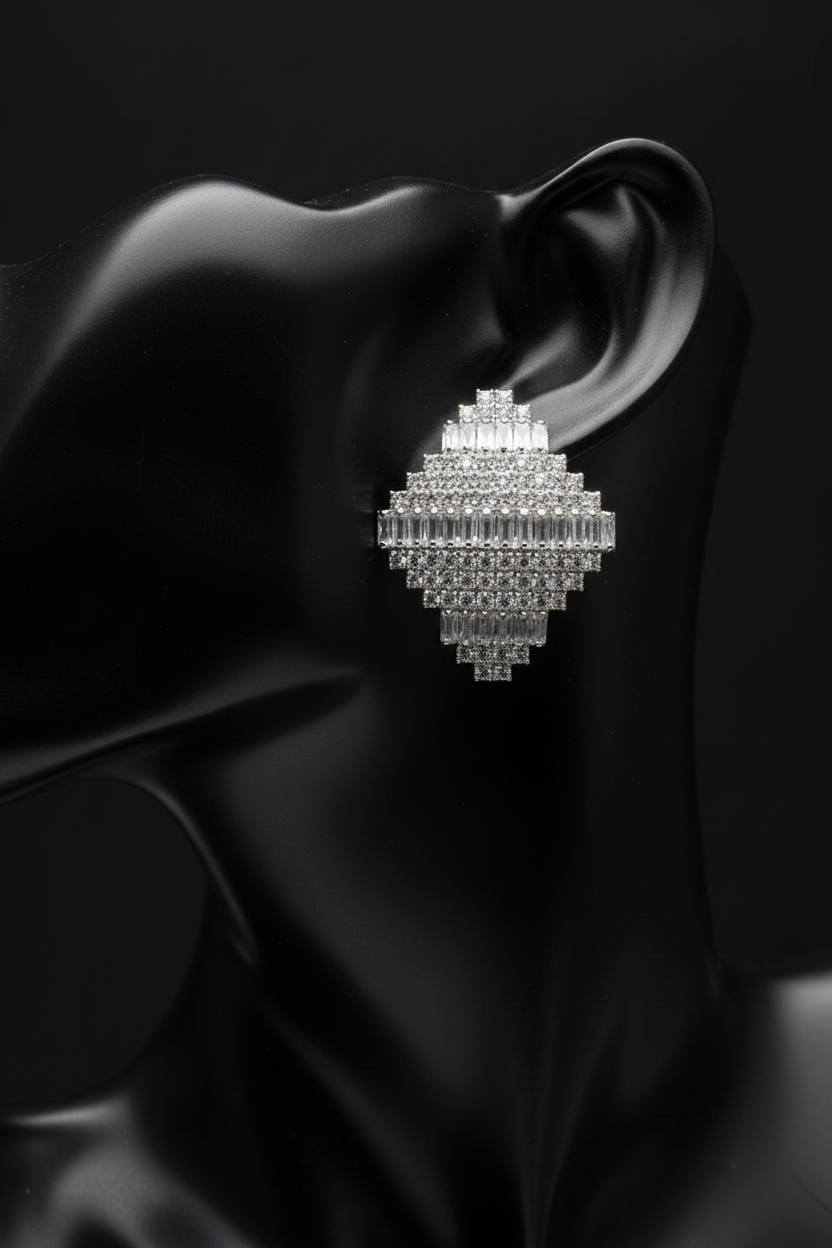 CZ baguette earrings on black mannequin close-up
