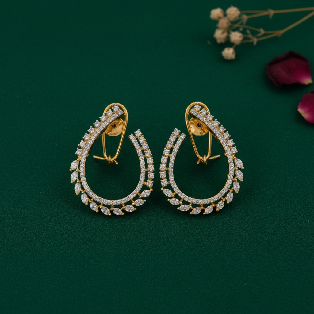 Gold Layered CZ Hoops - Emerald Green Flatlay